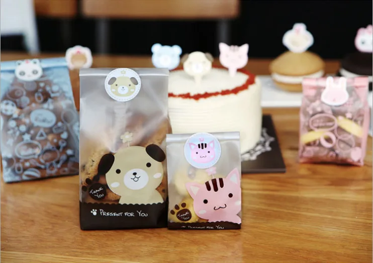 

50&100pcs/lot Cute Cat and Dog Cookie Bag Bread bag Gift Candy Package Snack Bag Jewelry bags Send children the Baking Gift