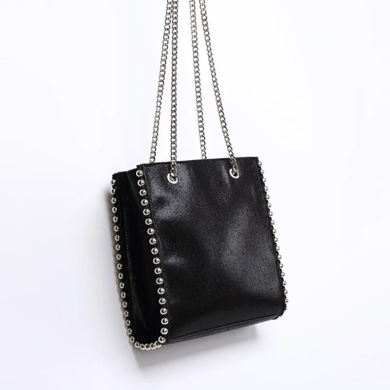 Bolso de mano Retro de gran capacidad para mujer, bolso de hombro con remaches de cadena de moda, bolso de cuero de Pu para mujer, bolso de Color sólido de Bolso de mano Retro de gran capacidad para mujer, bolso de hombro con remaches de cadena de moda, bolso de cuero de Pu para mujer, bolso de Color sólido de