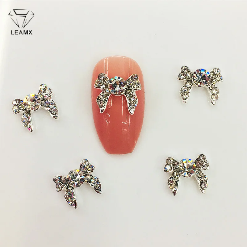 

LEAMX 10 PCS 3D Rhinestone Bow Nail Charms Decoration Glitter Silver Alloy Nails Accessory Manicure Tool Decor Salon L492