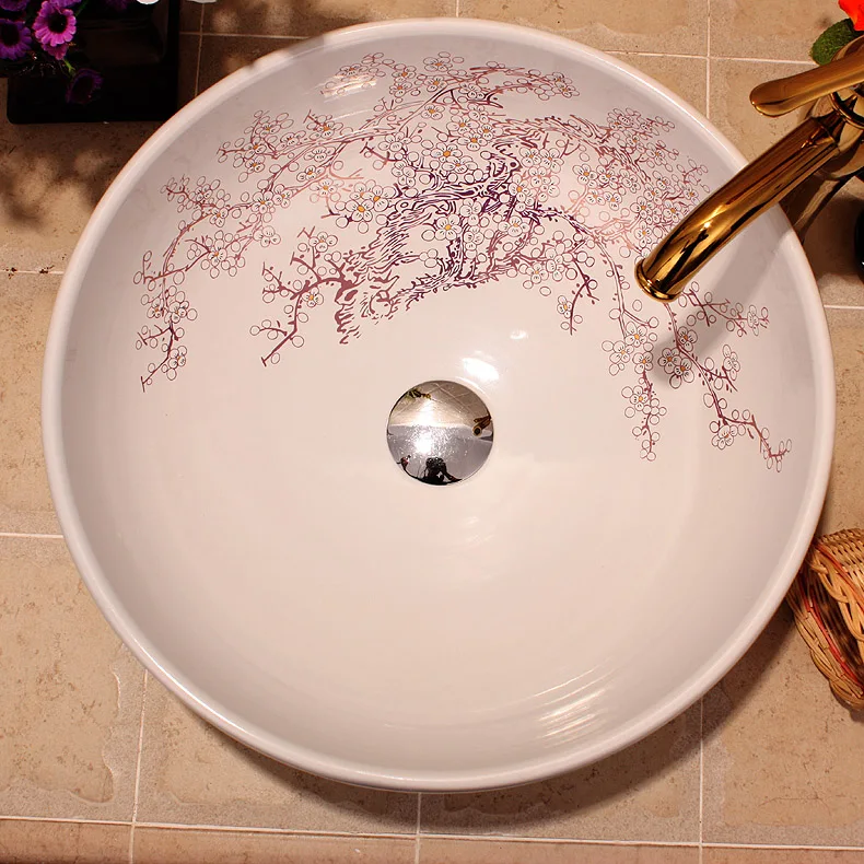 China Artistic Handmade Engraving Ceramic Lavobo Round Countertop size of wash basin plum blossom painting white (2)