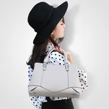 New casual fashion loading and unloading handle women leather handbags atmosphere wild shoulder slung middle-aged mother bag