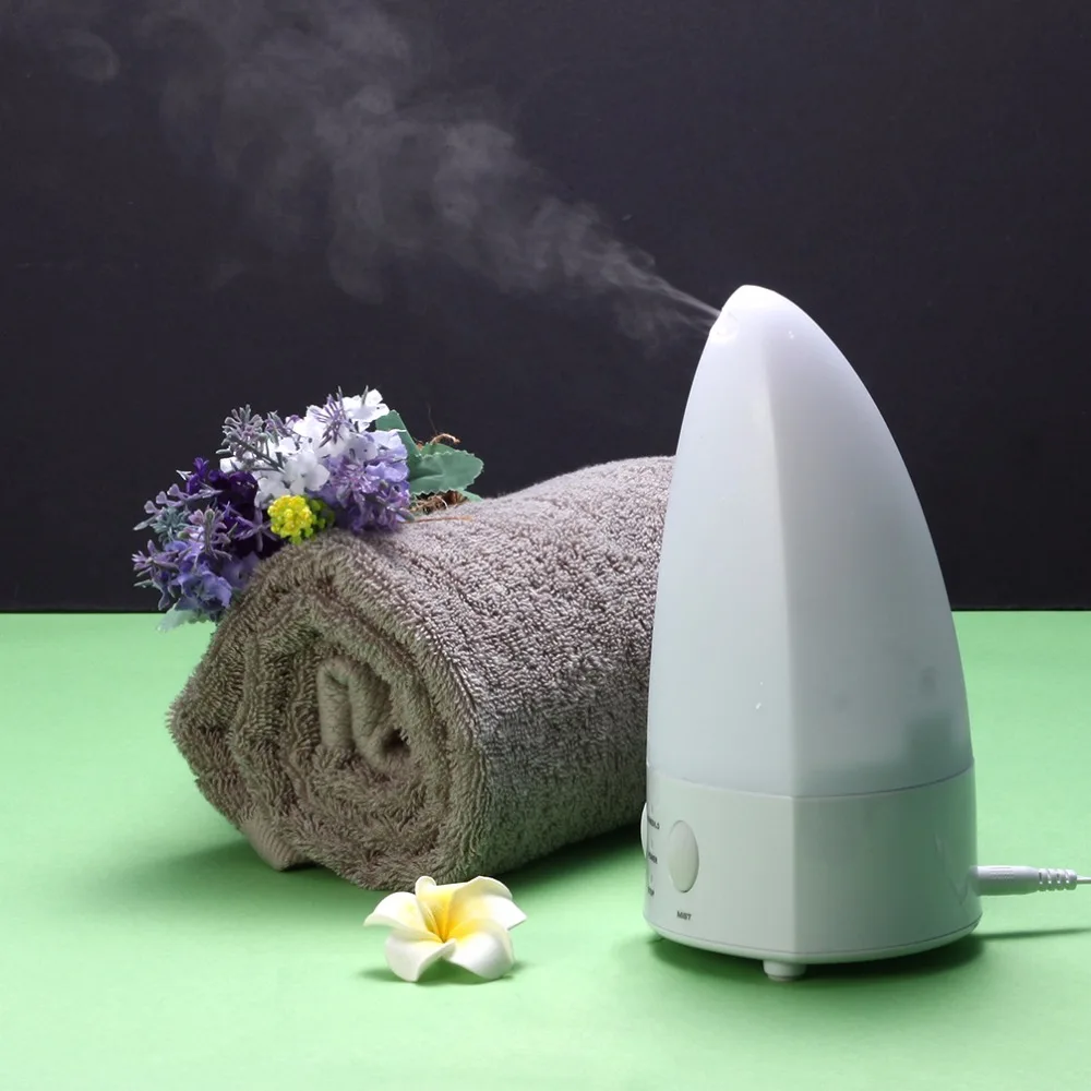 

NEW AROM  DIFFUSR AND HUMIDIFIER.Diffused by ultrasonic. Colourful LED light