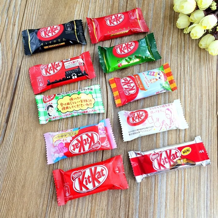 

28tiny bag Weight 16g.Mixed Japanese Kit Kat Chocolate.apple pie,pumpkin,black chocolate,milk,green tea,cheese.Grilled cheese.