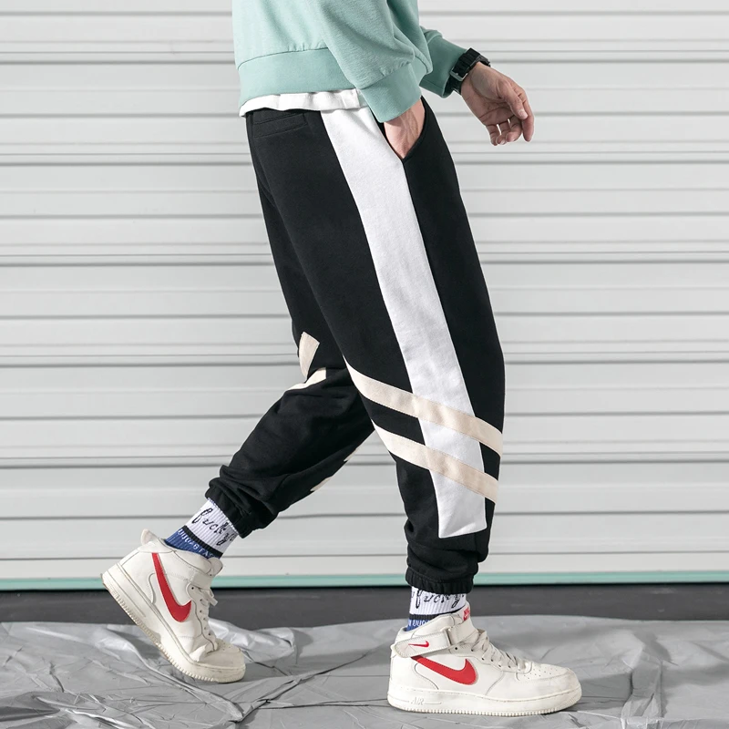 Брюки тренд 2019 весенние мужские joggings с эластичными манжетами спортивные штаны