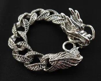 

Collectable Chinese Tibet Silver Carved Animal Dragon Bracelet A Pair Exquisite Small Statues