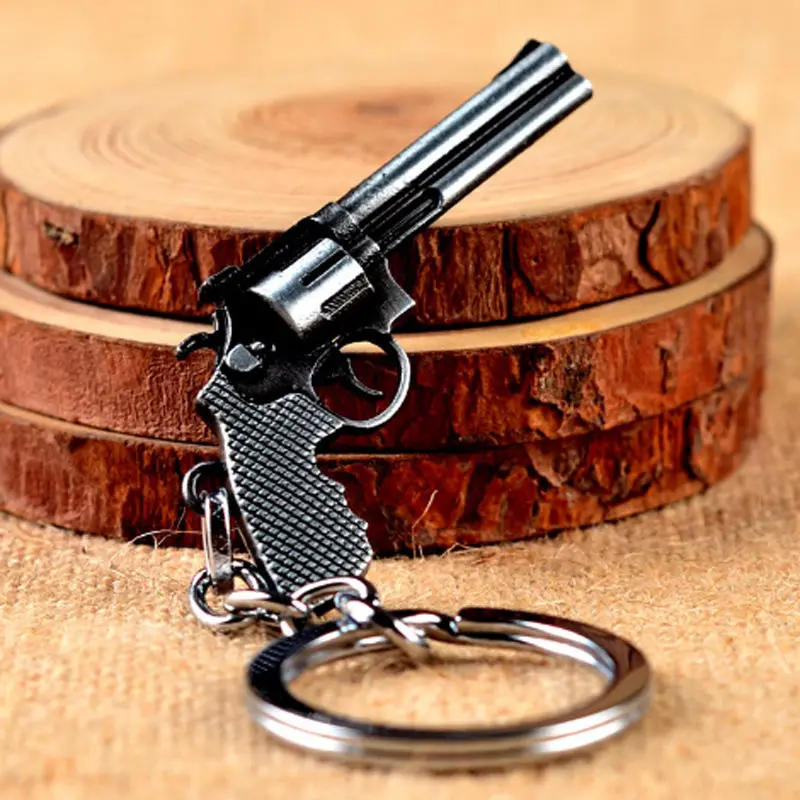 

TIOODRE Cool Revolver Pistol Weapon Gun Model Metal Keyring Keychain Mini Key Ring Car Key Chain Ring Holder Souvenir for Gift