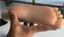 8 years old little girl’s feet, the palm of the foot, tiny feet