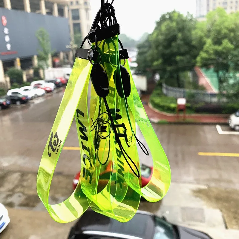 

Kpop BlackPink EXO Got7 TXT IZONE SEVENTEEN TWICE Keychain Fluorescent Green PVC Laser Transparent Phone Key Chain Rope Pendant