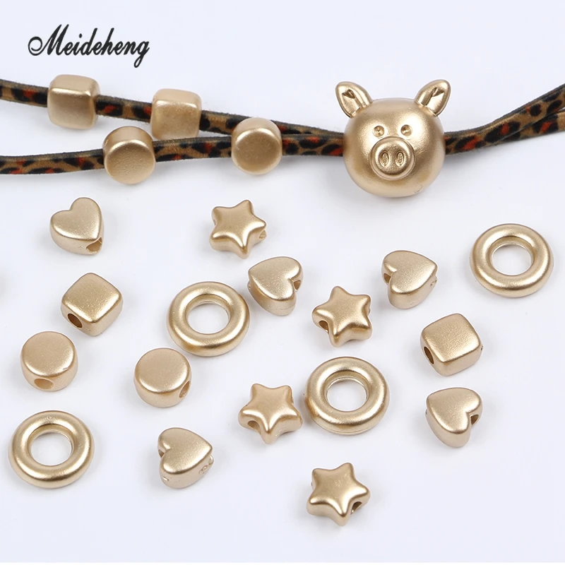 

Meideheng Acrylic Frosted Gold Charms Star Small Beads For Jewelry Making DIY Hair Ornaments Black Scorpion Hair Ring Decoration