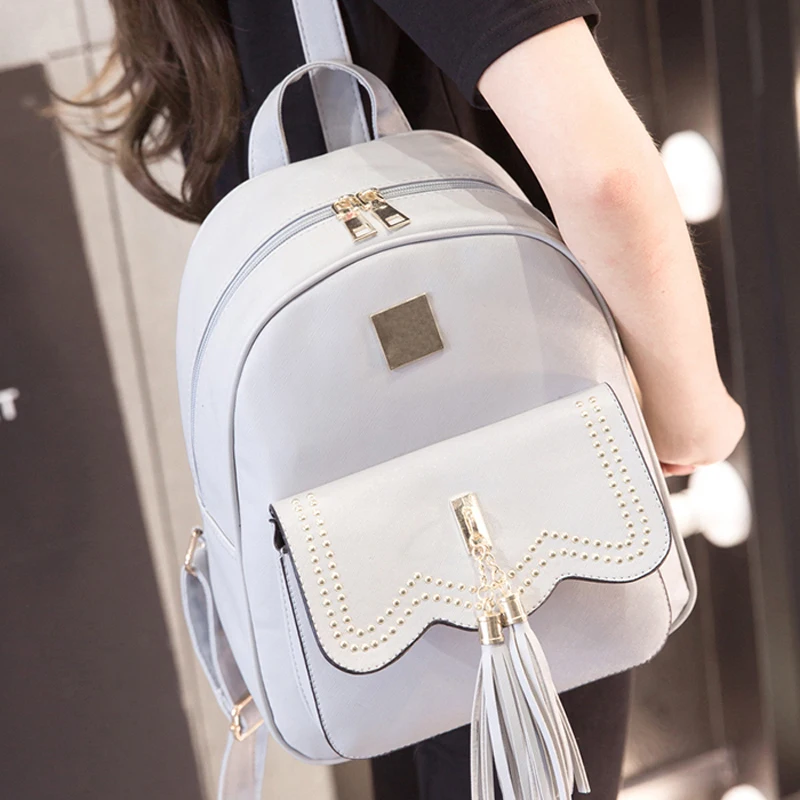 

DORANMI Preppy Style Rivet School Bags 2019 New Fashion Traveling Bag Hip Hop Style Hot Backpacks Women Casual Backpack SJB251