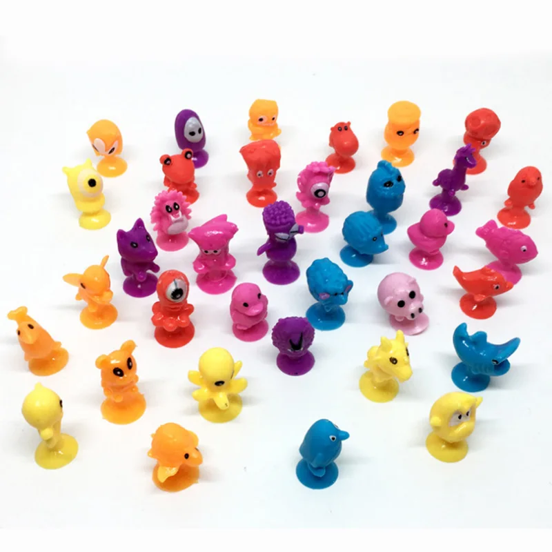 

10 PCS/LOT Mini Sucker Dolls 2.5cm Strange Animal Cupule Suckers kids Action Toy Capsule Model Suction Cup Puppets