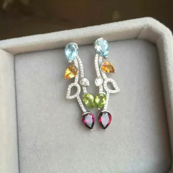 

silver inlaid natural color treasure earrings, world famous brand, with the same counter, but tens of thousands of Oh!