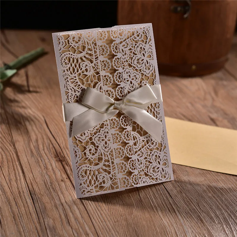 

20pcs 4 In 1 White Hollow Laser Cut Wedding Invitations Engagement Wedding Invitation Card With Ribbon Free Envelope Seals HOT!