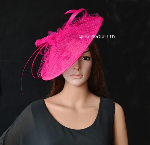 coral coloured wedding hats