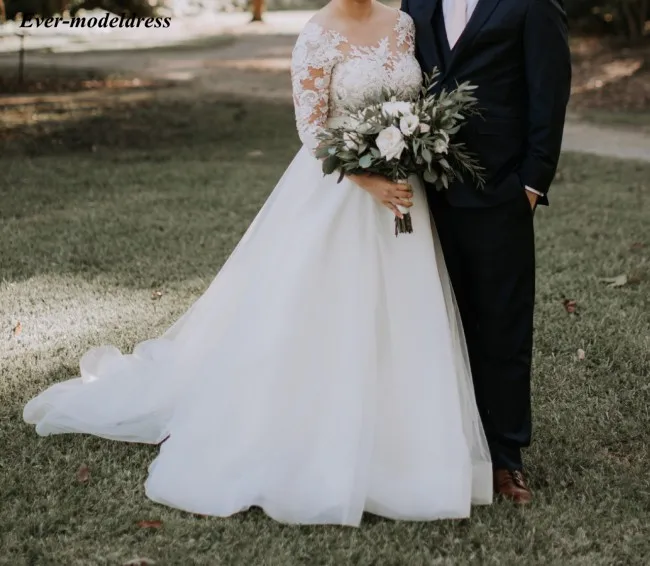 

Garden Wedding Dresses 3/4 Long Sleeves Lace Appliques Sheer O-Neck Button Back A-Line Bridal Gowns Customized Robe De Mariee