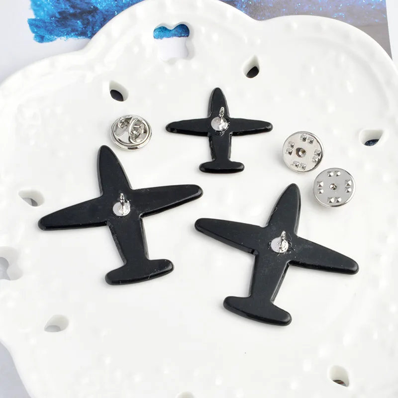 

Wholesale fashion explosion personality acrylic aircraft brooch set pin three sets of clothing