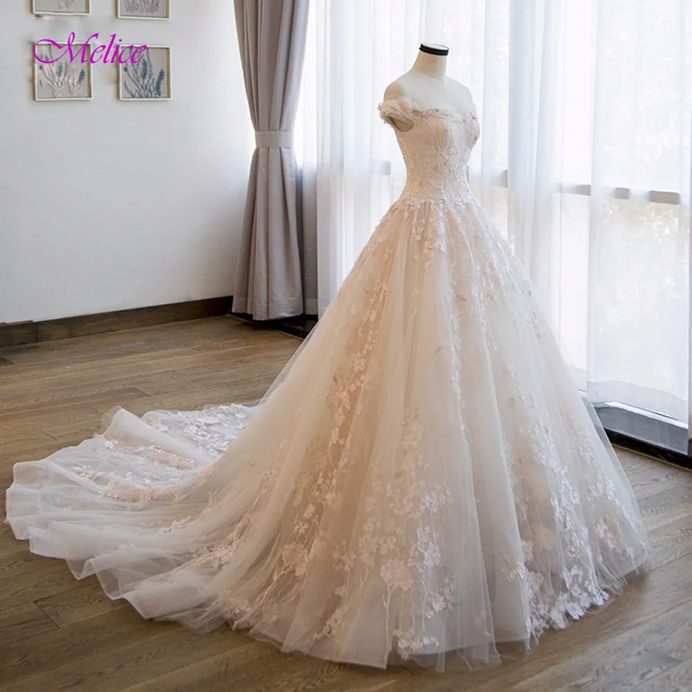 

Fsuzwel Elegant Sweetheart Neck Appliques Lace Princess Wedding Dress 2020 Fashion Cap Sleeve Beaded Bride Gown Vestido de Noiva