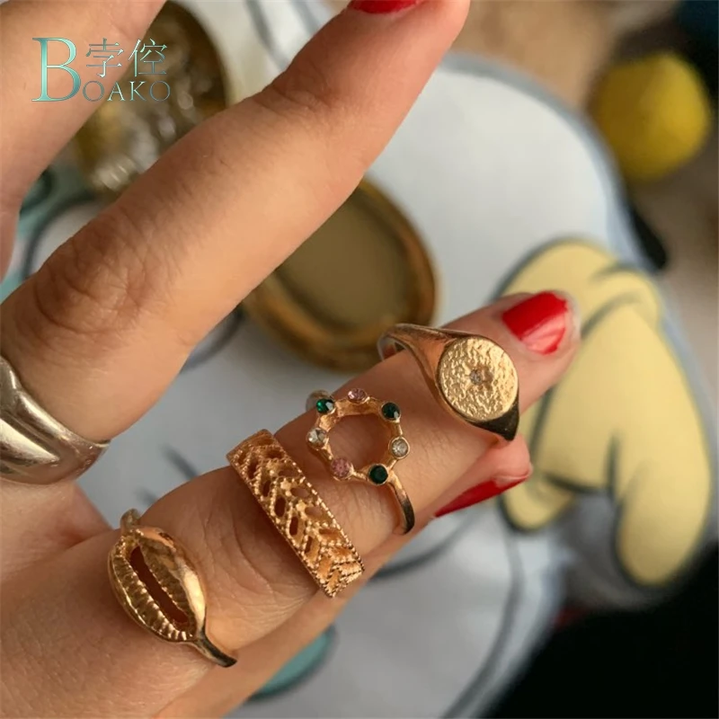 

BOAKO 4pcs/set Women Rings Summer Carved Ring Set Hollow Compass Colorful Rhinestone Shell Gold Rings For Women Bohemian anillos