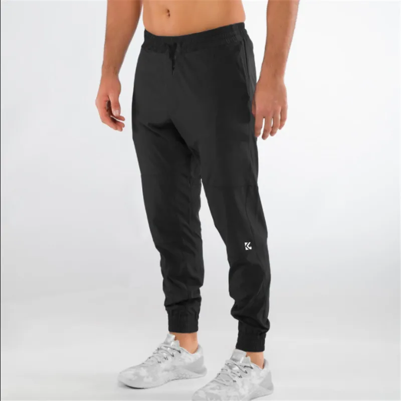 Летние новые спортивные штаны для бега, модные спортивные штаны, мужские повседневные брюки для бодибилдинга, фитнеса, мужская одежда