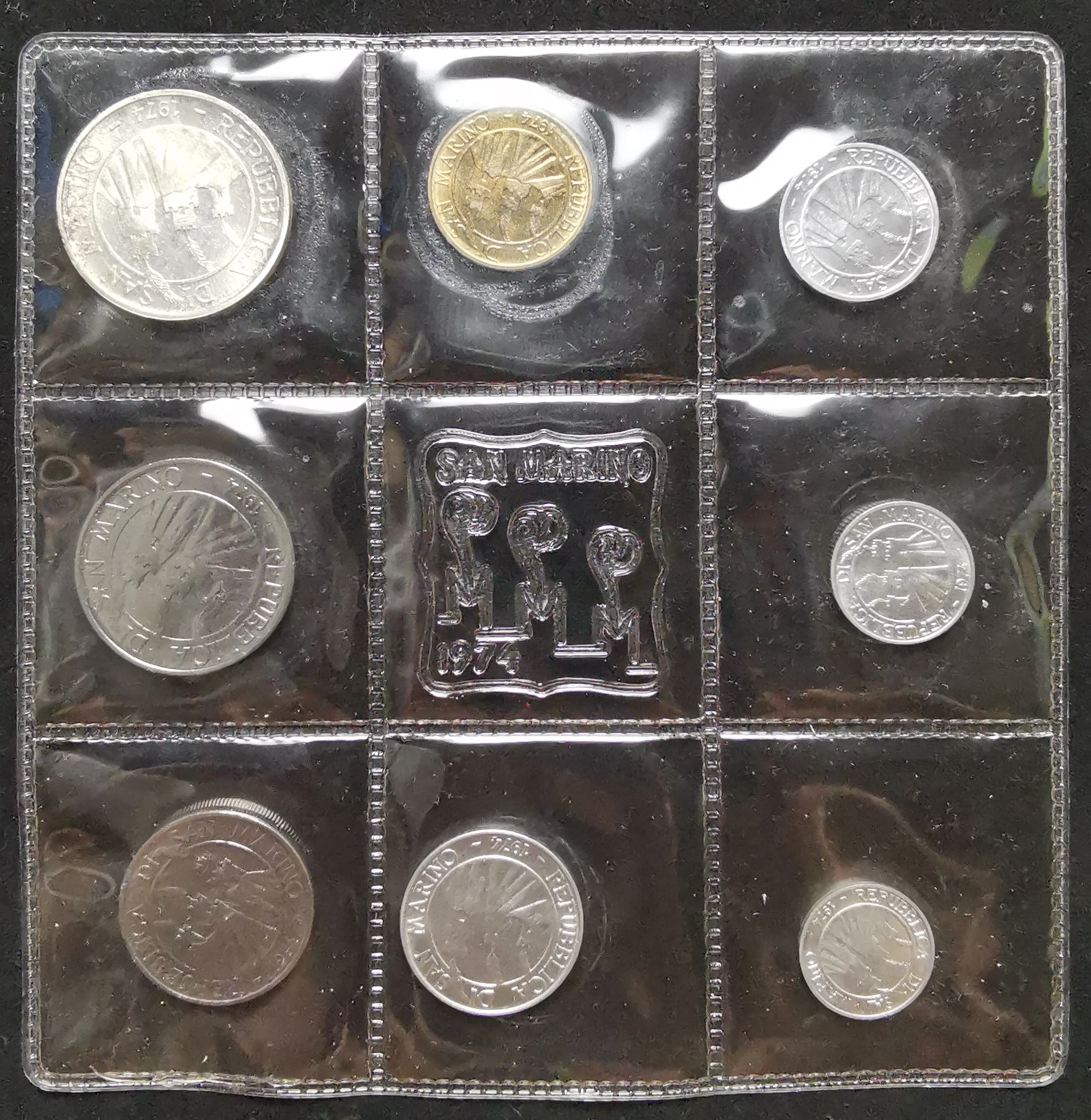 

Rarely with silver coin version 8pcs San Marino coin 100% original coin collection Not circulated 1974 year