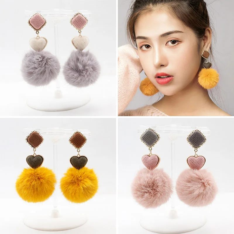 

Korean version of exaggerated rabbit fur ball earrings plush girl heart temperament love autumn and winter Joker earrings female
