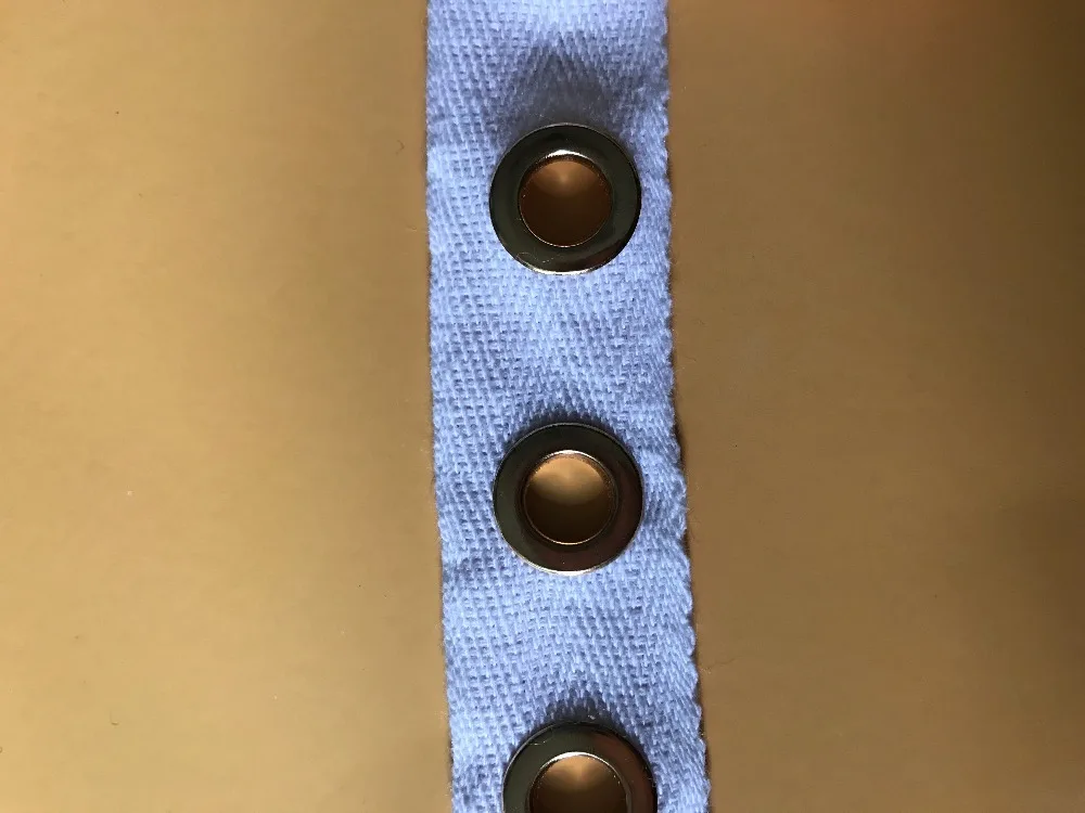 

1 yard off white or Black Grommet Tape with Nickel Eyelet Cotton Twill Tape on Trim
