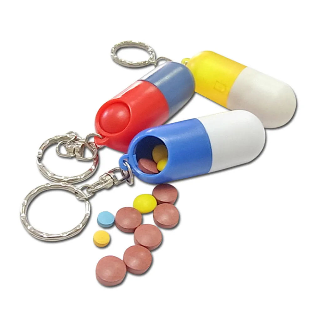 

Portable Capsule Shaped Travel Pill Box Case Container Key Chain 1 pc Fashion New Refillable Bottle