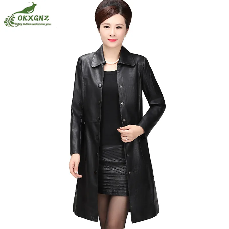 Leather sheath dress middle age woman movie out business