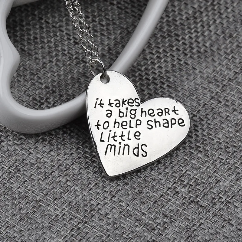 Image 10pcs lot It takes a big heart to help shape little minds Dog Tag Cut Out Heart Necklace Teacher Gift Jewelry