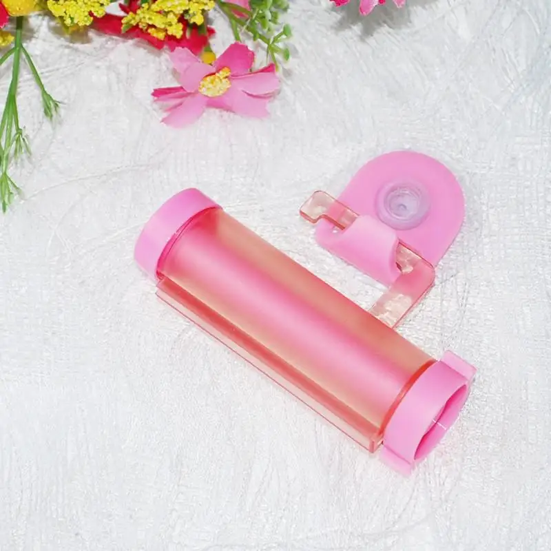 Пластиковая роликовая трубка соковыжималка Полезная Зубная паста Легкий дозатор держатель для ванной комнаты - Цвет: Розовый