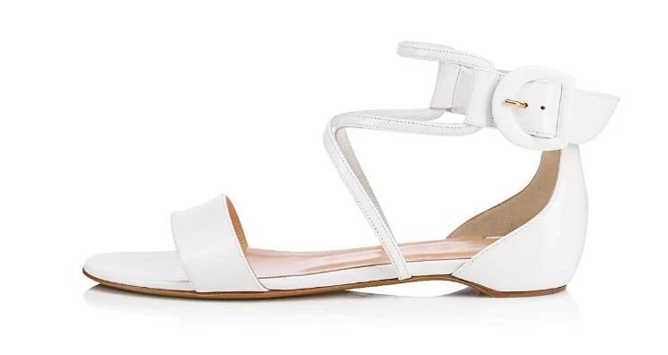 white cross flat sandals