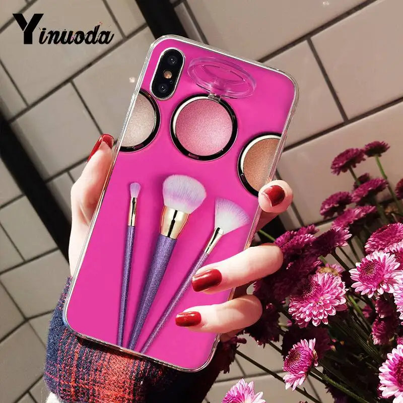 Beautiful girl's makeup brush painting