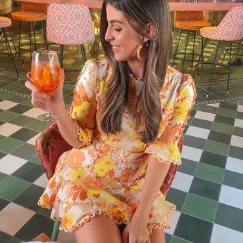 

Petal stitching ruffled holiday dress 2019 spring and summer new yellow sweet print high waist slim mid-sleeve dress short