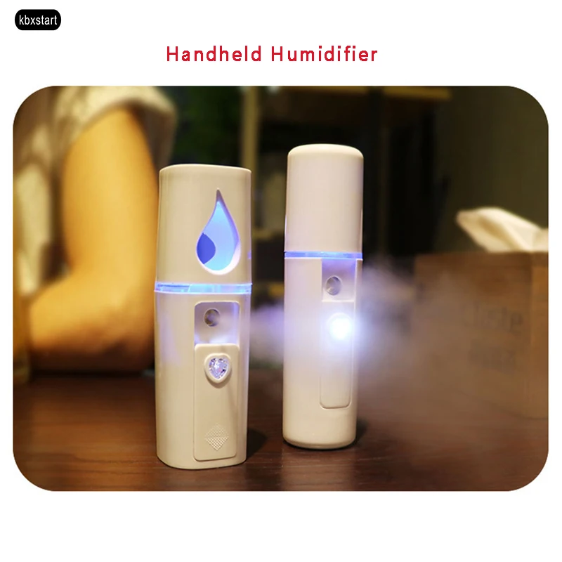 

Mini Handheld Humidifier USB Charging Portable Nano Spray Face Moisturizing Device Skin Spray Water Beauty Steaming Face Tool