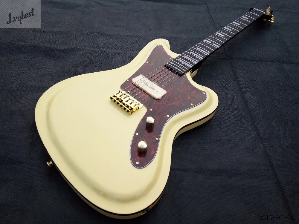 

High Quality electric guitar solid cream body,scallop shape edge,brownish neck ,ebony fingerboard,white inlay,customized logo!