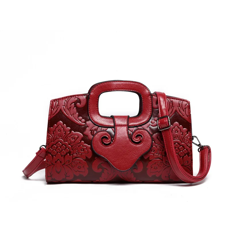 

2018 summer new Chinese embossed handbag fashion retro shoulder slung mobile ladies bag..