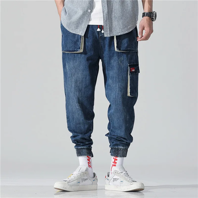 

Multi-pocket Men's jeans spring and summer style of overalls Nine-cent casual pants Hip hop loose Nine pants