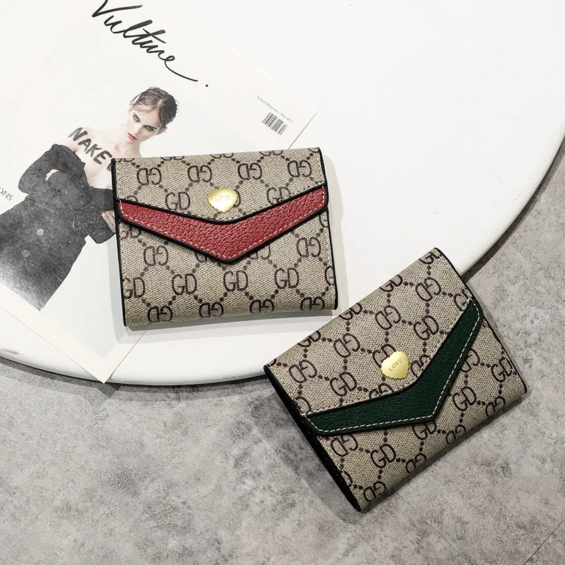 

New European and American brand wallet female short style simple multi-functional buckle soft leather fashion small wallet walle