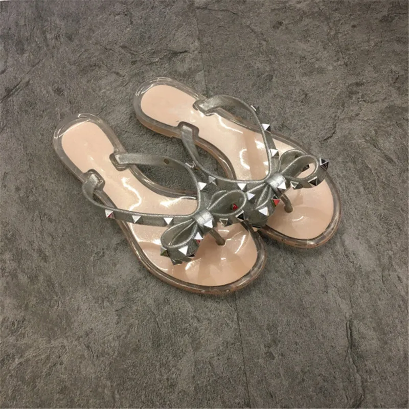 New Fashion Summer Woman Sandals Rivet Studs Flip Flops Slip On Bow knot Flat Slippers Studded Cool Beach Slides Jelly Shoes New Fashion Summer Woman Sandals Rivet Studs Flip Flops Slip On Bow knot Flat Slippers Studded Cool Beach Slides Jelly Shoes
