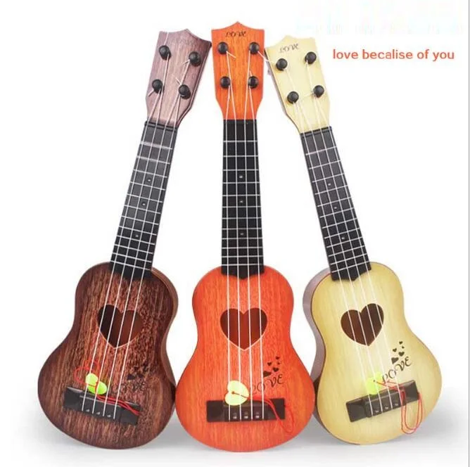 

Simulated Mini Four Strings for Children's Instruments to Enlighten Early Education Music Toy Guitar.