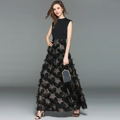 

Sleeveless round-necked dress large-tailed dresses high waist slim stitching fringed feathers