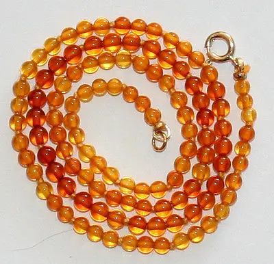 

1119 SMALL BALTIC COGNAK AMBER BEADS Gold CLASP KNOTTED NECKLACE