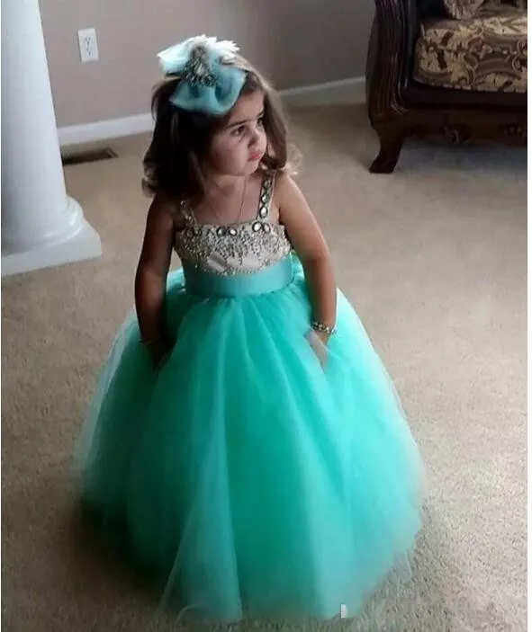 2017 Cheap Mint Green Flower Girl Dresses A-Line Spaghetti Backless Beaded Crystal Fluffy Tulle Girls Pageant Birthday Dress 2017 Cheap Mint Green Flower Girl Dresses A-Line Spaghetti Backless Beaded Crystal Fluffy Tulle Girls Pageant Birthday Dress