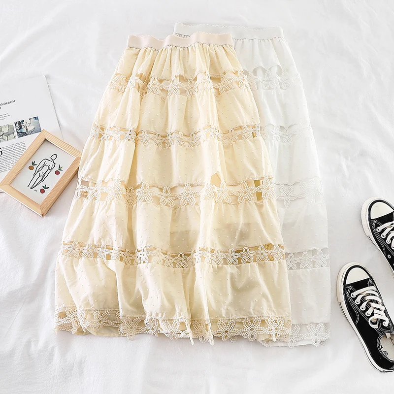 

2019 new fashion women's skirts Fresh and loose Hook flower hollow sweet Midi skirt J437