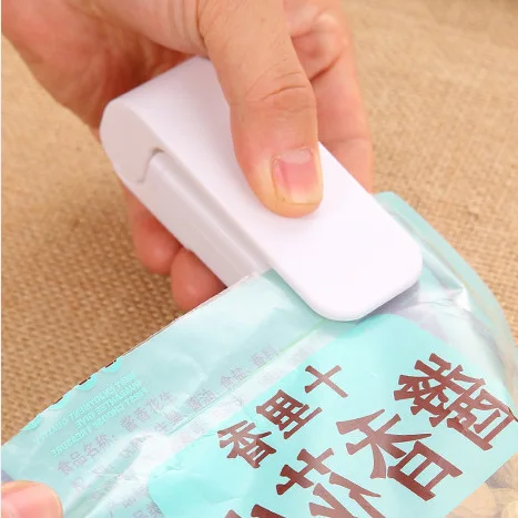 

1pc mini plastic bag sealing machine, portable small hand seal sealer, heat sealing machine, household kitchen office supplies