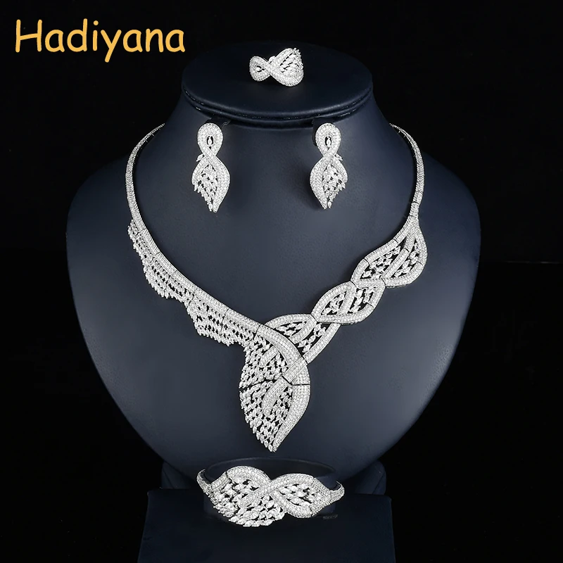 Hadiyana Модные женские свадебные ювелирные наборы для невесты роскошные кубические циркония дизайн в виде листьев Дубай 4 шт. набор ювелирных ... Hadiyana Модные женские свадебные ювелирные наборы для невесты роскошные кубические циркония дизайн в виде листьев Дубай 4 шт. набор ювелирных ...