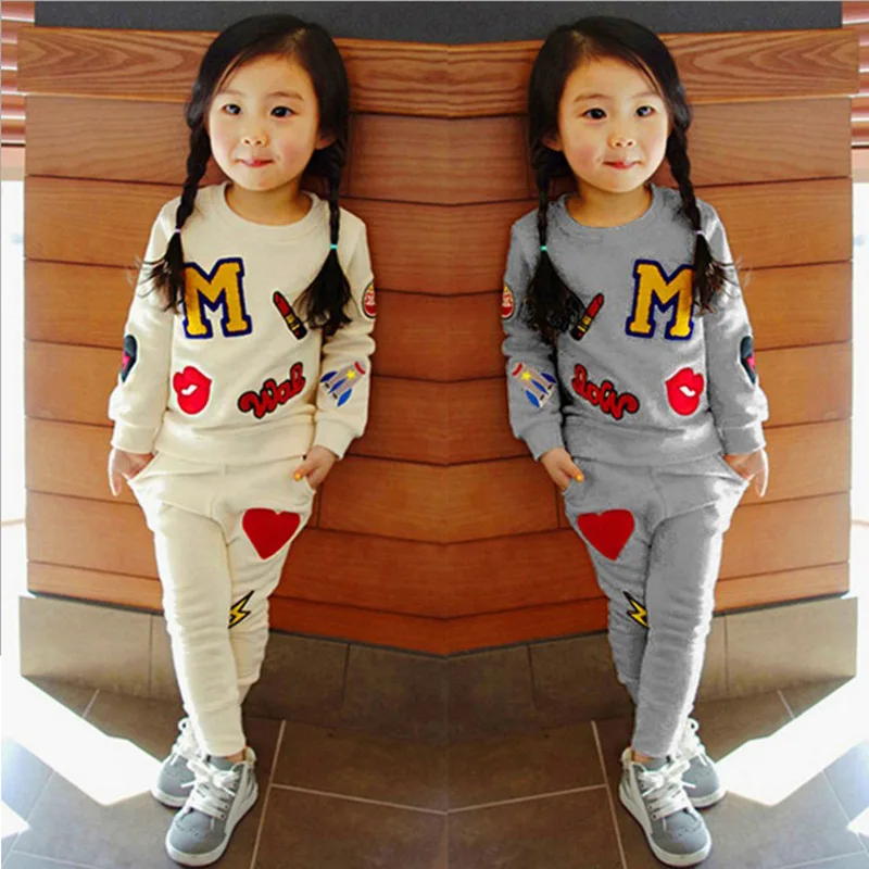 

Baby girl autumn and winter new cotton warm suit cartoon letter printing lipstick two-piece girl casual sports suit