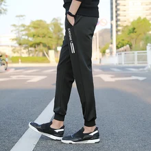 Новое поступление модные большие размеры 4XL новые спортивные брюки мужские брюки для пробежек эластичные свободные спортивные черные брюки для повседневные мужские брюки