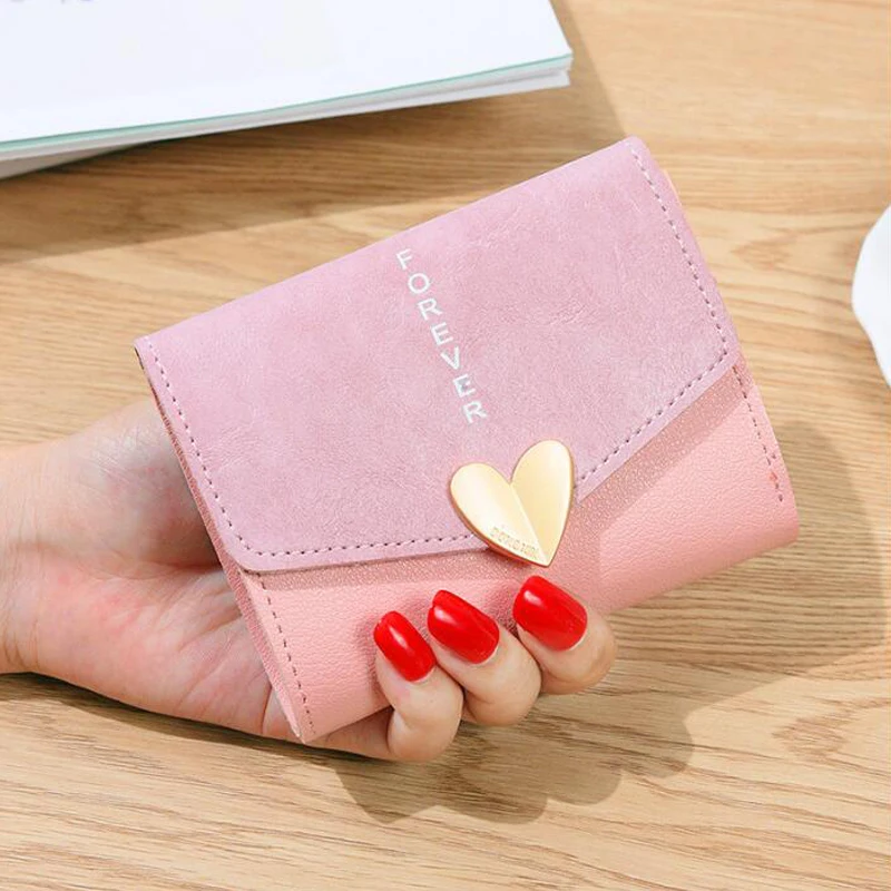 

2019 new mini wallet female short cute girl hardware heart-shaped wallet 3 fold student personality zero bag PU leather quality