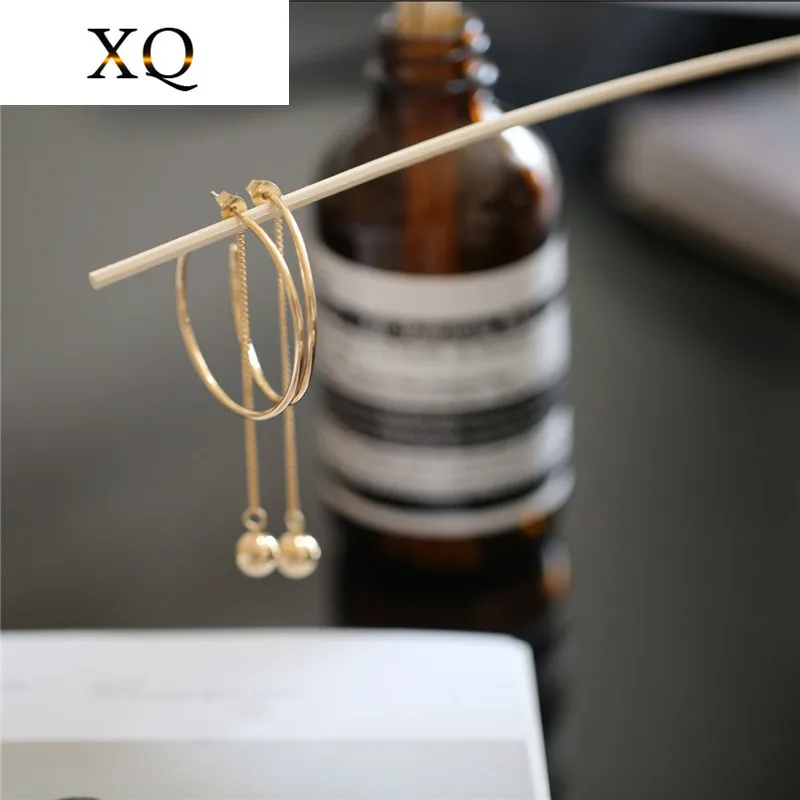 

Free shipping ladies jewelry Round long pendant long earrings anti-allergic needle high-end earrings fashion elegant